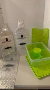 lot 1325 image: Multi compartment, food storage container and wine bottle covers