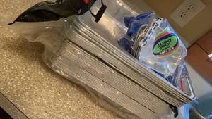 lot 1329 image: Disposable Weber drip pans, and baby loaf pans