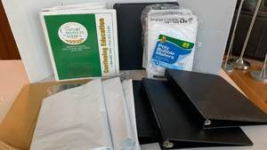 lot 1419 image: Binders, assorted envelops and Culinary institute cookbook