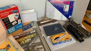 lot 1429 image: Office supplies hole punch, stapler, pens, envelops and more