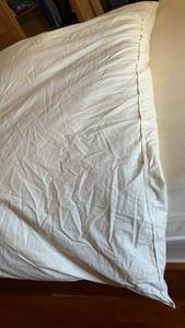 lot 1534 image: Altered Down comforter with stains. Would be great in a duvet cover