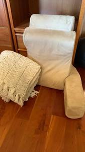 lot 1538 image: Beige reading pillow with arms with Knit Throw Blanket