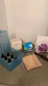 lot 1569 image: Jewelry cleaners, epsom salt, medicine bottles and tongue suppressors