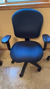 lot 2003 image: Rolling adjustable office chair 38x28x24 located in basement has walkout
