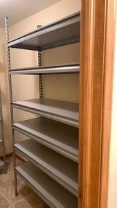 lot 2104 image: Heavy Duty Metal Storage Shelving Unit with Adjustable Shelves 77 x48x18 located in basement