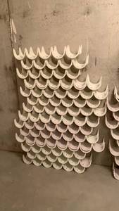 lot 2300 image: Plastic Wine rack 52x34 located in basement