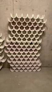 lot 2301 image: Plastic wine rack 60x37 located in basement