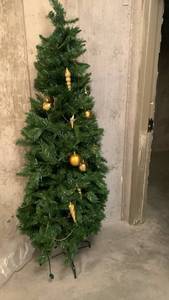 lot 2304 image: 6 ft decorated Christmas tree located in basement