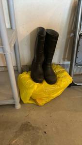 lot 3001 image: Rubber boots and a bag of concrete