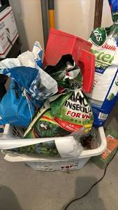 lot 3018 image: Basket of Gardening supplies - Potting Soil, Fertilizer, plant covers, spreader,  and more