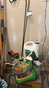 lot 3020 image: Two Shepherd��s hooks, weed killer and root stimulator