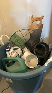 lot 3021 image: Tub with rope handles, full of garage items - saw, watering can and more