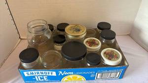 lot 3204 image: Jars of various sizes.  Some with lids.