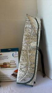 lot 3232 image: Windshield Shades and a box of vacuum pack bags
