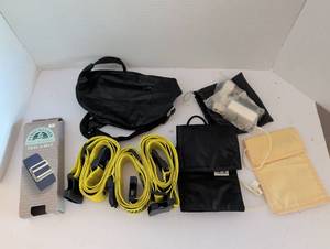 lot 3318 image: Travel Accessories Bundle with fanny pack, wallets, voltage converters and Luggage Straps