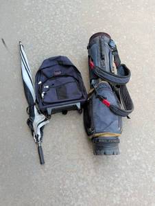 lot 3409 image: Belding Golf Bag, umbrella and Coronado Rolling Backpack