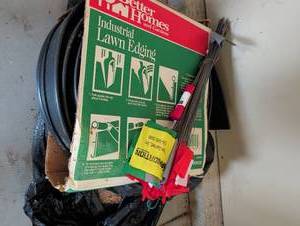 lot 3418 image: Industrial Lawn Edging, flagging and partial bag of sand and gravel