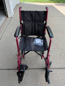 lot 3428 image: Lightweight Transport Wheelchair