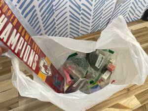 lot 311436 image: 15 Item Mystery Bag (misc. makeup, phone accessories, electronics, hug toys, stuffed animals, keychains, household items, etc.)