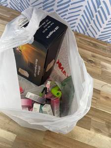 lot 311441 image: 15 Item Mystery Bag (misc. makeup, phone accessories, electronics, hug toys, stuffed animals, keychains, household items, etc.)