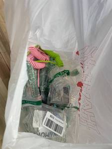 lot 311442 image: 15 Item Mystery Bag (misc. makeup, phone accessories, electronics, hug toys, stuffed animals, keychains, household items, etc.)