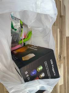 lot 311443 image: 15 Item Mystery Bag (misc. makeup, phone accessories, electronics, hug toys, stuffed animals, keychains, household items, etc.)