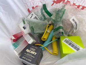 lot 311444 image: 15 Item Mystery Bag (misc. makeup, phone accessories, electronics, hug toys, stuffed animals, keychains, household items, etc.)