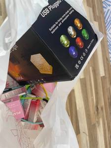 lot 311446 image: 15 Item Mystery Bag (misc. makeup, phone accessories, electronics, hug toys, stuffed animals, keychains, household items, etc.)