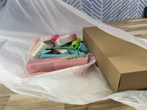lot 311451 image: 15 Item Mystery Bag (misc. makeup, phone accessories, electronics, hug toys, stuffed animals, keychains, household items, etc.)