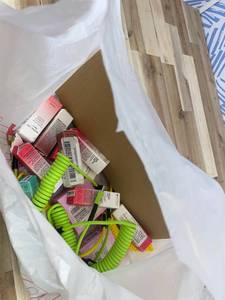 lot 311454 image: 15 Item Mystery Bag (misc. makeup, phone accessories, electronics, hug toys, stuffed animals, keychains, household items, etc.)