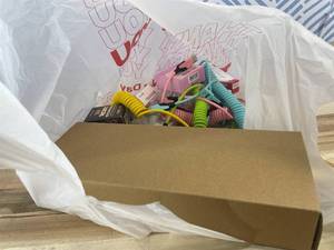 lot 311455 image: 15 Item Mystery Bag (misc. makeup, phone accessories, electronics, hug toys, stuffed animals, keychains, household items, etc.)