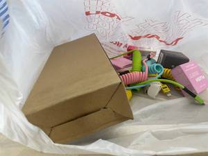 lot 311456 image: 15 Item Mystery Bag (misc. makeup, phone accessories, electronics, hug toys, stuffed animals, keychains, household items, etc.)