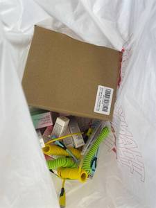 lot 311457 image: 15 Item Mystery Bag (misc. makeup, phone accessories, electronics, hug toys, stuffed animals, keychains, household items, etc.)