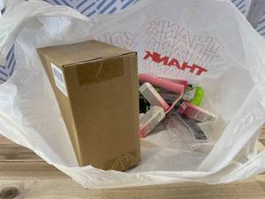 lot 311458 image: 15 Item Mystery Bag (misc. makeup, phone accessories, electronics, hug toys, stuffed animals, keychains, household items, etc.)