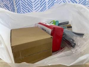 lot 311459 image: 15 Item Mystery Bag (misc. makeup, phone accessories, electronics, hug toys, stuffed animals, keychains, household items, etc.)