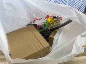 lot 311464 image: 15 Item Mystery Bag (misc. makeup, phone accessories, electronics, hug toys, stuffed animals, keychains, household items, etc.)
