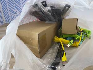 lot 311472 image: 15 Item Mystery Bag (misc. makeup, phone accessories, electronics, hug toys, stuffed animals, keychains, household items, etc.)