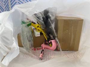 lot 311477 image: 15 Item Mystery Bag (misc. makeup, phone accessories, electronics, hug toys, stuffed animals, keychains, household items, etc.)