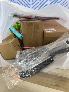 lot 311481 image: 15 Item Mystery Bag (misc. makeup, phone accessories, electronics, hug toys, stuffed animals, keychains, household items, etc.)