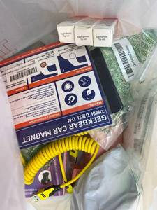 lot 411374 image: 15 Item Mystery Bag (misc. makeup, phone accessories, electronics, toys, stuffed animals, keychains, household items, etc.)