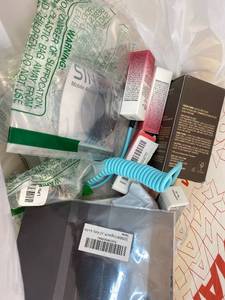 lot 411375 image: 15 Item Mystery Bag (misc. makeup, phone accessories, electronics, toys, stuffed animals, keychains, household items, etc.)