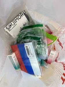 lot 411376 image: 15 Item Mystery Bag (misc. makeup, phone accessories, electronics, toys, stuffed animals, keychains, household items, etc.)