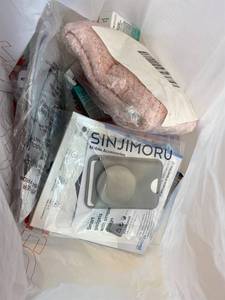 lot 411388 image: 15 Item Mystery Bag (misc. makeup, phone accessories, electronics, toys, stuffed animals, keychains, household items, etc.)