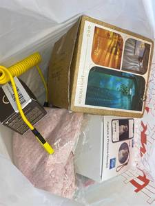 lot 411389 image: 15 Item Mystery Bag (misc. makeup, phone accessories, electronics, toys, stuffed animals, keychains, household items, etc.)