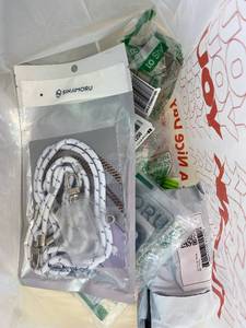 lot 411393 image: 15 Item Mystery Bag (misc. makeup, phone accessories, electronics, toys, stuffed animals, keychains, household items, etc.)