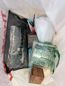lot 411397 image: 15 Item Mystery Bag (misc. makeup, phone accessories, electronics, toys, stuffed animals, keychains, household items, etc.)