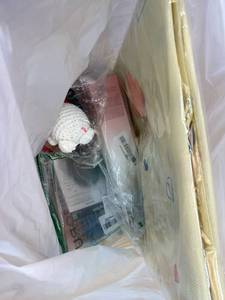 lot 411400 image: 15 Item Mystery Bag (misc. makeup, phone accessories, electronics, toys, stuffed animals, keychains, household items, etc.)