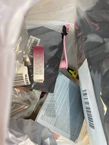lot 411406 image: 15 Item Mystery Bag (misc. makeup, phone accessories, electronics, toys, stuffed animals, keychains, household items, etc.)