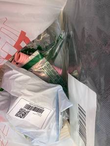 lot 411407 image: 15 Item Mystery Bag (misc. makeup, phone accessories, electronics, toys, stuffed animals, keychains, household items, etc.)