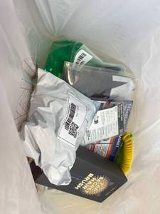 lot 411411 image: 15 Item Mystery Bag (misc. makeup, phone accessories, electronics, toys, stuffed animals, keychains, household items, etc.)
